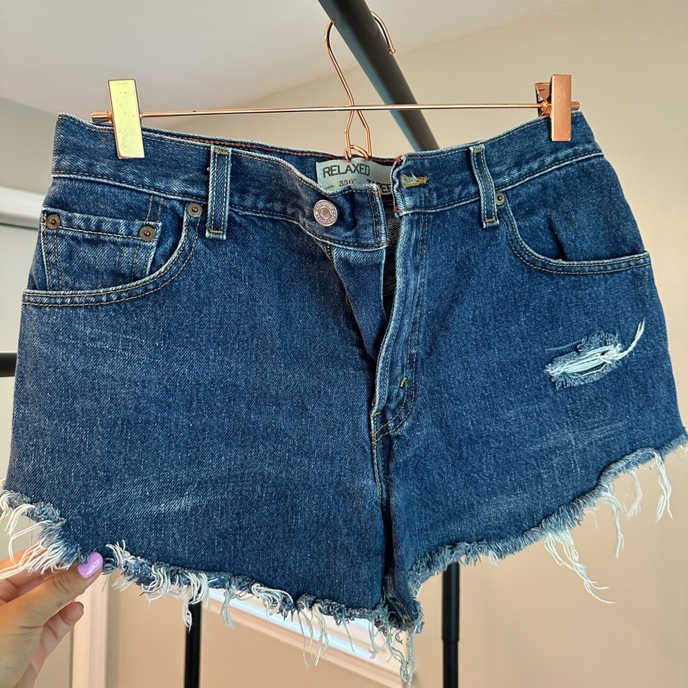 Vintage distressed Levi’s high waisted Jean shorts